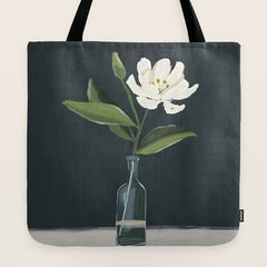A flower in a vase Tote Bag