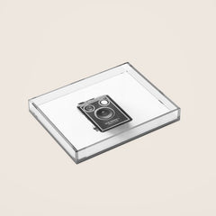 A Kodak Brownie analog vintage camera on a white background Retro photography in black and white Acrylic Tray