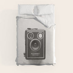 A Kodak Brownie analog vintage camera on a white background Retro photography in black and white Duvet Cover