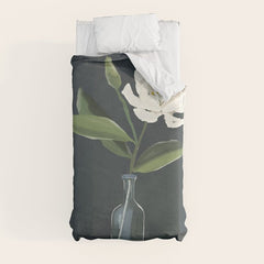 A flower in a vase Duvet Cover