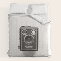 A Kodak Brownie analog vintage camera on a white background  Retro photography in black and white Comforter