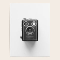 A Kodak Brownie analog vintage camera on a white background  Retro photography in black and white Poster