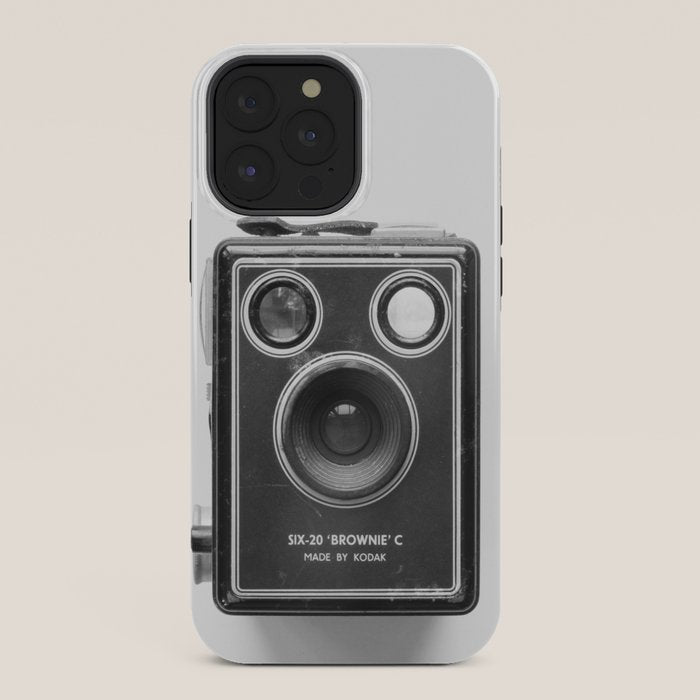 A Kodak Brownie analog vintage camera on a white background  Retro photography in black and white iPhone Case