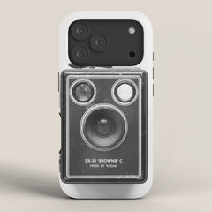 A Kodak Brownie analog vintage camera on a white background  Retro photography in black and white iPhone Case
