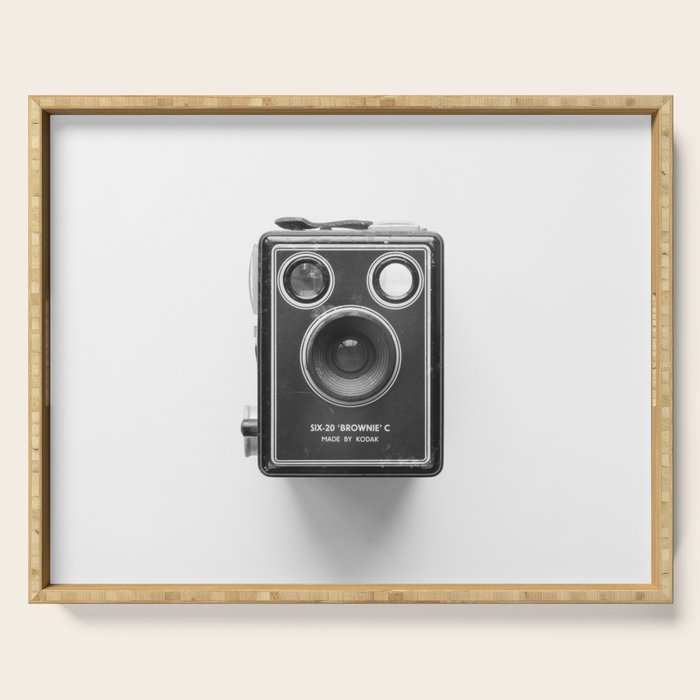 A Kodak Brownie analog vintage camera on a white background  Retro photography in black and white Serving Tray