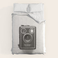 A Kodak Brownie analog vintage camera on a white background  Retro photography in black and white Comforter