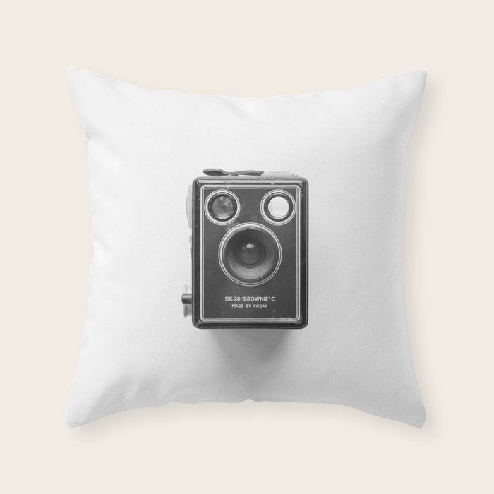 A Kodak Brownie analog vintage camera on a white background  Retro photography in black and white Throw Pillow
