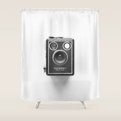 A Kodak Brownie analog vintage camera on a white background  Retro photography in black and white Shower Curtain