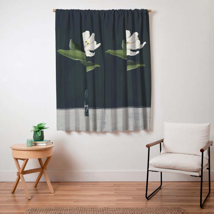 A flower in a vase Window Curtain