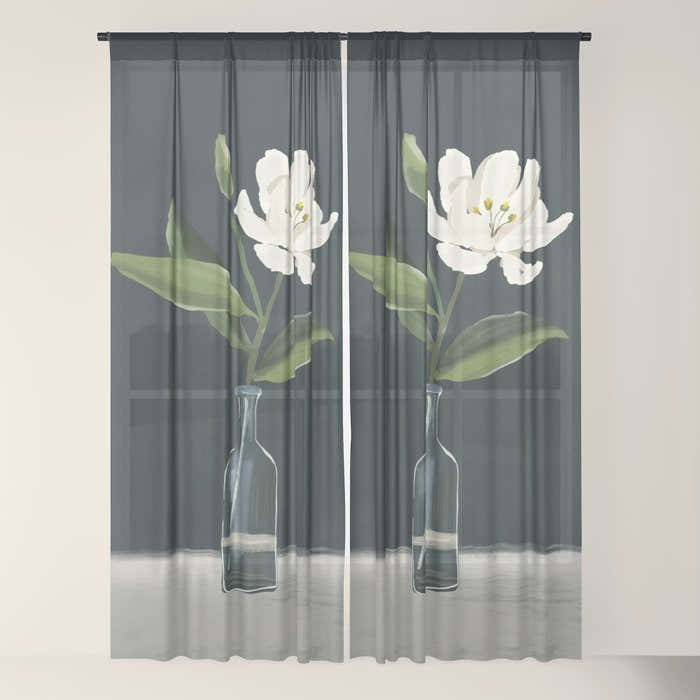 A flower in a vase Window Curtain