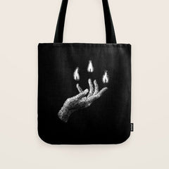 A Light in the Dark Tote Bag