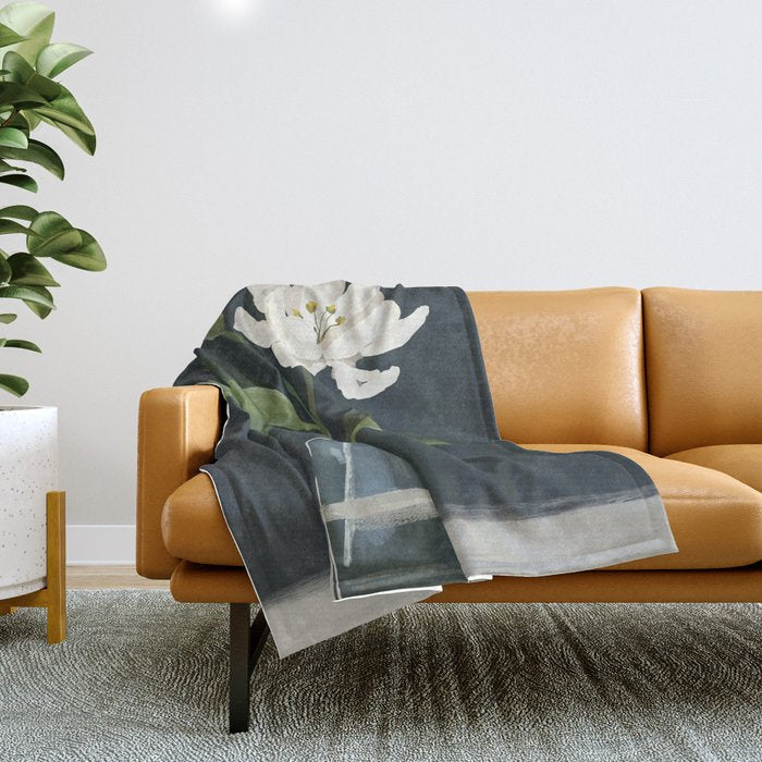 A flower in a vase Throw Blanket
