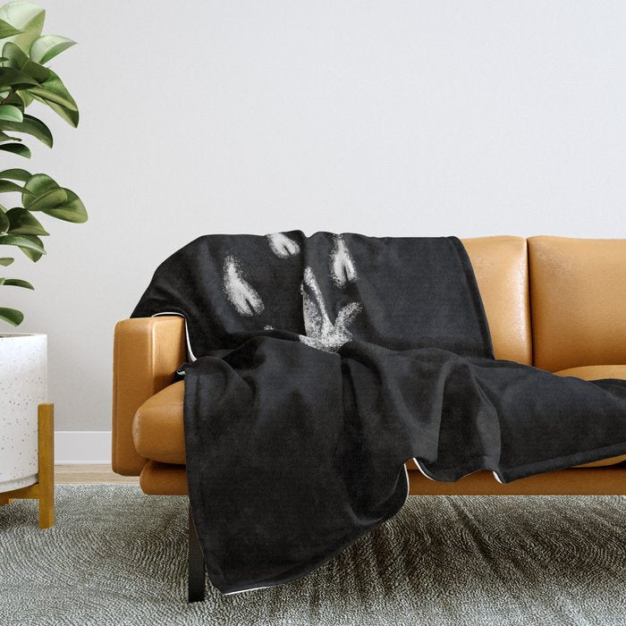 A Light in the Dark Throw Blanket