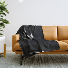 A Light in the Dark Throw Blanket