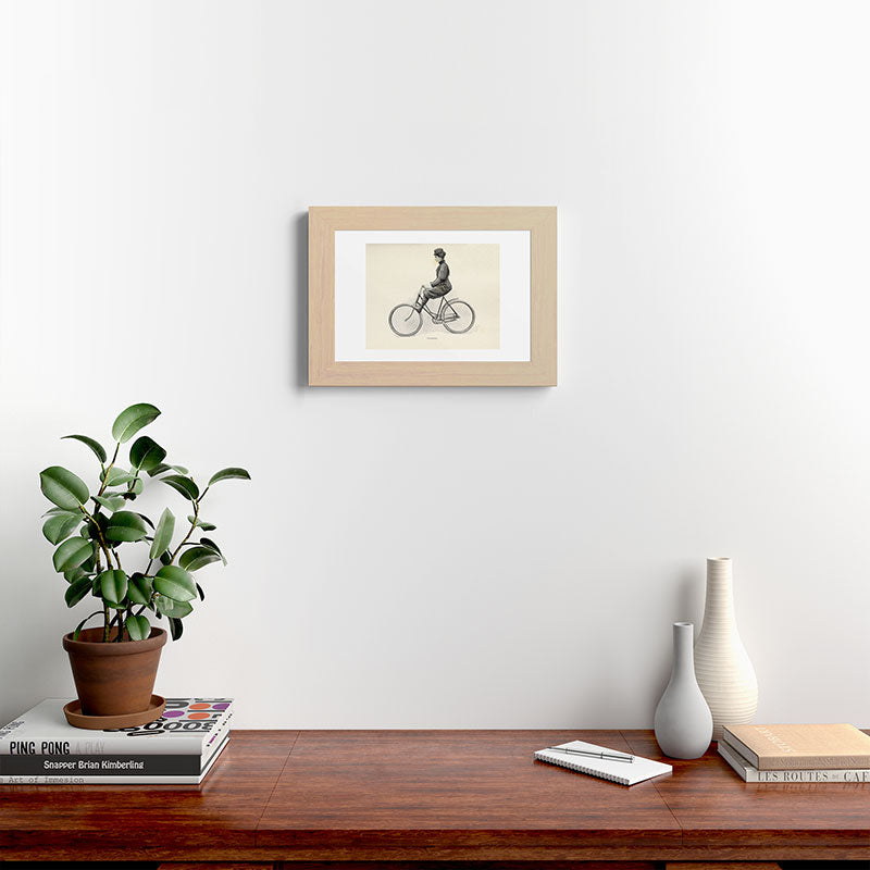"Coasting" from "Bicycling for Ladies" by Maria E. Ward, 1896 Framed Art Print