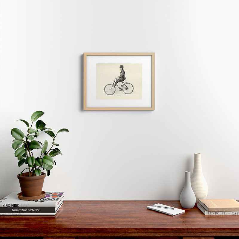 "Coasting" from "Bicycling for Ladies" by Maria E. Ward, 1896 Framed Art Print