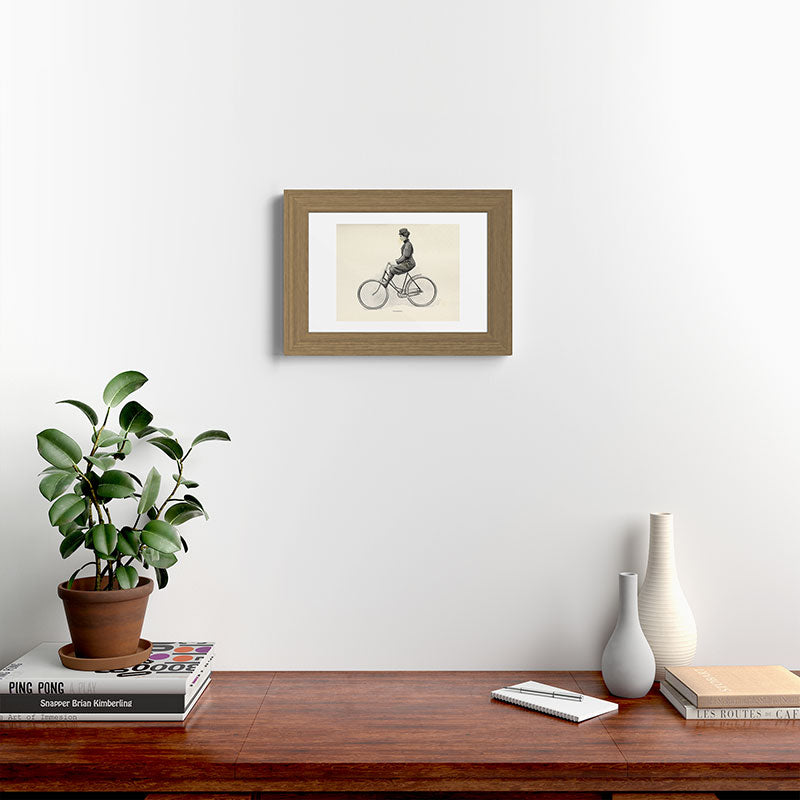 "Coasting" from "Bicycling for Ladies" by Maria E. Ward, 1896 Framed Art Print