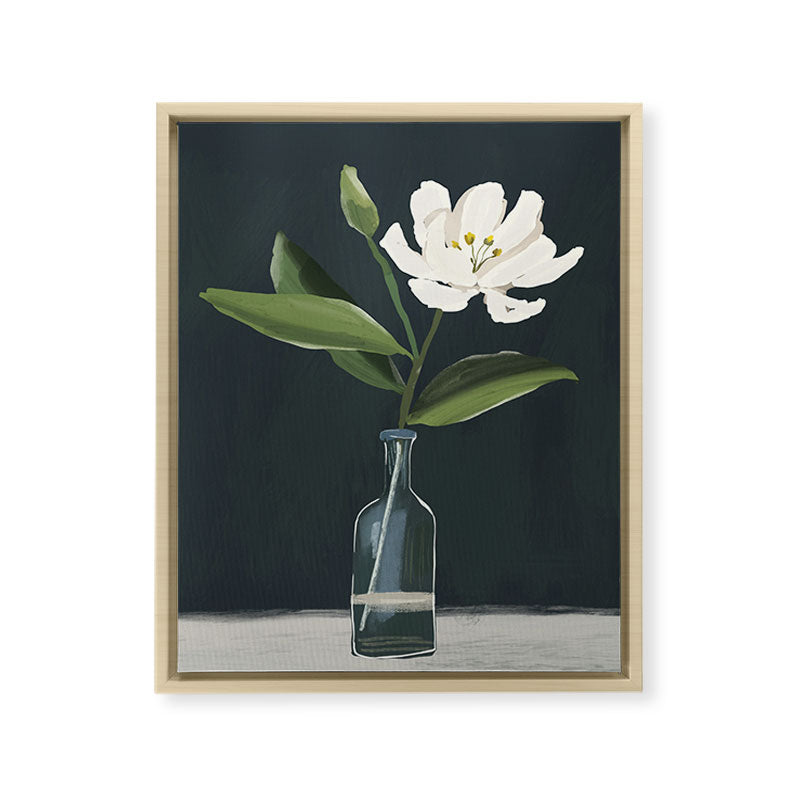 A flower in a vase Framed Canvas Print
